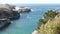 Rock crag of cliff, ocean beach, Point Lobos, California coast. Waves crashing.