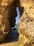 Rock crevice opening in Lagos, Portugal beach