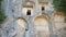 Rock-cut tombs carved into vertical cliffs at Termessos, modern Antalya province, Turkey.