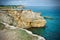 Rock Dinosaur looks over the Caribbean Sea