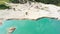 Rock dumps of ilmenite quarry and blue lake, aerial view