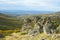 Rock escarpment with background autumnal oak