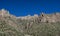Rock face and saguaro cacti against a blue sky in Sabino Canyon, Tucson, Arizona