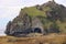 Rock formation with cave at Halldorsskora or Elephant Rock on the Coast of Heimaey Island- Vestmannaeyjar-Westman Islands-Iceland