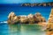 Rock formation in the ocean on the beach Praia da Rocha