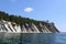 Rock formation over the sea. Summer hot day.