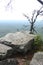 Rock formation overlooking valley.