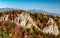 Rock formations Haliny in Great Fatra mountains, Slovakia. Hill Krivan from High Tatras mountains at background