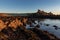 Rock Formations Lead the Eye to a Scottish Ruined Castle on a Rock