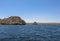 Rock formations in Nasser lake with beautiful blue water, at Aswan High Dam on the Nile river in Egypt. View over the huge stones.