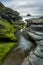 Rock gully, with vibrant green seaweed, Trebarwith Strand, Cornwall