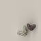 Rock heart shape on sand , 3D rendering