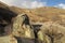 Rock in the hilly steppe in autumn