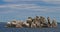 Rock island with cormorants in Lake Victoria
