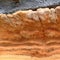 Rock layers of lava and red tuff on Madeira