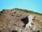 A Rock Like a Stone Lizard Sprawled On a Mountainside