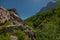 Rock and mountains around popular tourist attraction in Valbona valley, Albania, a Mulliri i Vjeter old mill house. Bridge leading