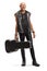 Rock musician in leather outfit with a guitar case smiling at the camera