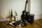 Rock\'n\'roll setup with ukulele, acoustic guitar, speaker, candle