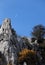 Rock outcroppings in autumn, with the moon