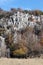 Rock outcroppings in autumn, sunny day