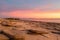 A rock platform beach at sunset at Karumba on the Gulf of Carpentaria