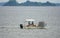 Rock Point, Maryland, U.S - August 15, 2020 - A boat picking up the crab pots on Potomac River