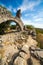 Rock ruin arch in mountains of France
