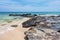 Rock, sand, sea and sky