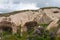 Rock sandstone wall of an ancient house of Cappadocia. Beautiful texture of the wall of an ancient cave dwelling.