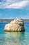 Rock in the sea at the beach in Baska Voda resort