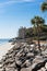 Rock Seawall Toward Piers and Beach Houses