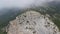 Rock Shaan-Kaya with sheer walls and overgrown with coniferous forest, Crimea