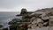 Rock stack and rocky coast by Portland Bill Lighthouse on the Isle of Portland Dorset England UK