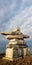 Rock stacking under the blue sky