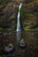 Rock stacks in front of Horsetail Falls in Oregon