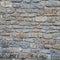 Rock stones wall of horizontal stone outdoor facade square background