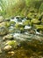 Rock strewn countryside river