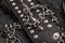 Rock style leather spikes and chains. Gothic background.