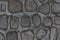 Rock wall of natural river stones. Round stones wall background. River round Stones pattern. Stones texture. River rocks.