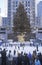 Rockefeller Square with snowy ice skating rink and Christmas tree in mid-town Manhattan, NY