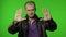 Rocker man showing stop gesture with hands. No, never, disliking and rejecting sign. Chroma key