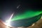 Rocket launch and aurora. Elements of this image furnished by NASA