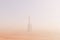 Rocket over Martian desert surface, fog in the atmosphere. 3d illustration