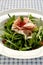 Rocket salad with parma ham and pomegranite seeds