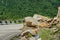 Rockfall on the road in the mountains.