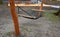 rocking chair, hammock with wooden support among the
