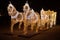 rocking decorated horses in magic christmas lights in city