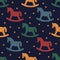 Rocking horse silhouette. Seamless pattern with rocking horses on dark blue background.