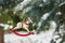 Rocking horse and snowy pine tree decorated for Christmas